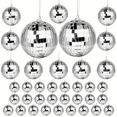 a bunch of shiny disco balls hanging from strings with the number six on each ornament