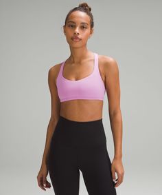 Meet you at yoga This strappy open-back bra is ready for all the ways you move, stretch, and open. Designed for Yoga. Intended for low-impact activities. Pockets for optional, removable cups. Lululemon Sports Bras, Lulu Sports Bra, Stomach Toning Workouts, I Love To Run, B Cup, Running Bra, Lululemon Sports Bra, Summer Fun List, Play Tennis