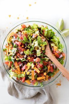 southwest salad with chipotle crema in a glass bowl