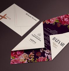 two folded business cards with flowers on them