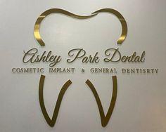 the logo for ashley park dental cosmetic implants and general dentisty is shown