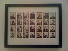 a black and white photo hanging on the wall with many people in it's frames