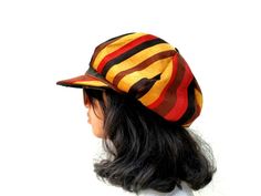 This Rasta Jamaican Bucket hat is perfect for Summer Reggae Festivals. This solid Bucket hat features a Jamaican Rasta Inspired Striped Band atop a solid , Red green yellow Rasta color bucket hat. Rock this hat as you dance the night away at your next outdoor concert or event. Fashionable and a must-have . This Hat is unisex that looks great on both men and women . This Hat is very durable and can be used as a special gift . -Solid Unisex Jamaican Adult Sun Hat -Rasta Reggae Inspired Striped Ban Retro Festival Cap Style Hat, Retro Festival Cap, Vintage Multicolor Flat Cap, Retro Cap Hat One Size, Retro One Size Cap, Retro One-size Cap, Vintage Baseball Cap For Festivals, Adjustable Flat Cap For Festivals, Adjustable Multicolor Flat Cap