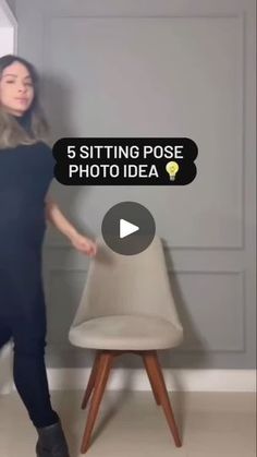 a woman standing in front of a chair with the caption sitting pose photo idea