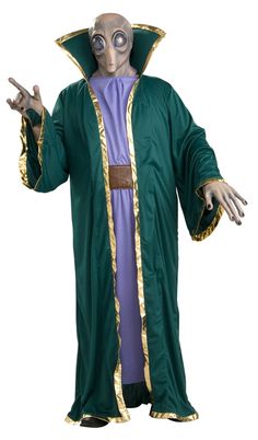 a man in a green robe and purple shirt with his hands out to the side