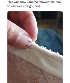 someone is trying to sew the stitches on their left hand and it looks like they are