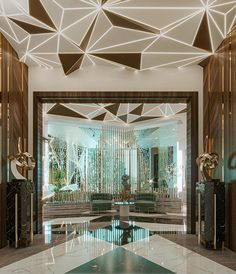 an elegant lobby with marble floors and walls