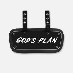 a black and white bag with the word god's plan on it, hanging from a hook