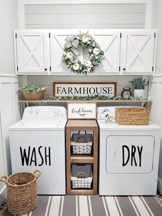 a white washer and dryer sitting inside of a laundry room