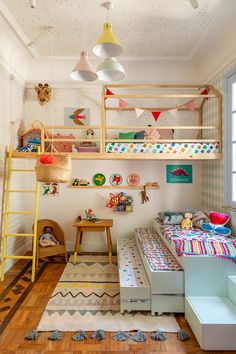 a child's bedroom with bunk beds and toys