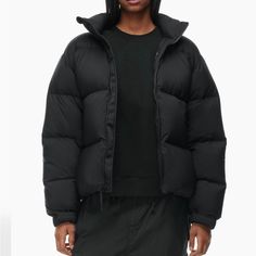 This Is A Super Warm Jacket Sold At Aritzia Which Is In Mint Condition. So Stylish And Timesless. Worn Once! Women’s Size Medium In Black This Puffer Contains 100% Responsibly Sourced Goose Down. The Mega Puff Is Mega Puffy And Mega Warm Because It's Mega Filled With 100% Responsibly Sourced Goose Down. It’s Made With Climatte Water-Repellent And Wind-Resistant Ripstop Fabric With A Matte Finish And A Soft Feel. It’s Sourced From A Japanese Mill That Specializes In Performance Fabrics. This Version Is Wind Resistant. Aritzia Puffer Jacket, Aritzia Puffer, Black Puffer Jacket Outfit, Winter Wishlist, Puffer Jacket Outfit, Down Puffer Jacket, Black Puffer Jacket, Puffer Jacket Women, Ripstop Fabric