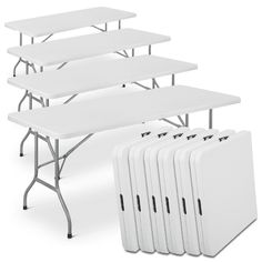 six white folding tables and four rectangle tables