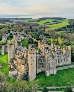 an aerial view of a castle in the countryside