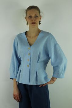 "Write the selected color in the message Handmade sky blue V neck linen blouse with front buttons and long sleeves, perfect for casual wear and suitable for any occasion in any season Details: - 100% natural linen produced in Europe ; - medium weight (180 gram per square meter); - color: sky blue, could be any from our colors catalog (color samples at the photo); Made to order, approximately a few days, If you have any questions please message me and I will be glad to answer. Size guide : Size X Blue Linen V-neck Blouse, Light Blue Tops With Button Cuffs For Daywear, Light Blue Summer Tops With Button Cuffs, Spring Linen Tops With Buttons, Light Blue Long Sleeve Tops With Button Cuffs, Linen Button Tops For Daywear, Linen Tops With Buttons For Daywear, Blue Linen Top With Buttons, Light Blue Relaxed Fit Linen Tops