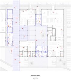 the floor plan for an office building, with red dots on the floor and white walls