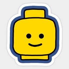 a yellow lego head sticker on a white background