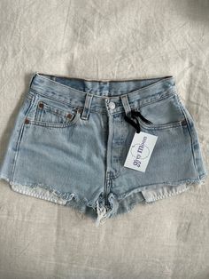 Vintage 501 daisy dukes short shorts. Perfect light wash.  Measurements taken while flat 12 in waist (24 in) 18.5 in hip (37 in) 1 in inseam  10 in rise Spring Light Wash Jean Shorts, Light Wash Relaxed Fit Jean Shorts, Light Wash Relaxed Fit Shorts, Light Wash Summer Shorts, Light Wash Cutoff Jean Shorts For Spring, Vintage Medium Wash Summer Shorts, Vintage Medium Wash Shorts For Summer, Vintage Light Wash Shorts For Summer, Vintage Light Wash Summer Shorts