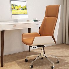 an office chair sitting in front of a computer monitor on top of a white desk