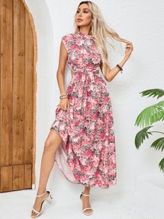 Transform into a carefree island goddess with our Floral Printed Cutout Maxi Dress. The open back design will keep you cool and stylish while the bold floral print will make you stand out. Perfect for a beach getaway or a summer day out. Paradise awaits! Size Guide: Model is 5’8” tall, and has a 33.4” bust, 26.4” waist, & 35.4” hips. She is wearing a S / US 4 / AU 8. This dress is true to size. Material: 100% Polyester. Feature: High neckline. Short Sleeves. Floral Print. Cut-Out Waist. Open Back. Maxi length. Not lined. Relaxed fit. Back neck button closure. Care Instructions: Machine wash / Cold hand wash