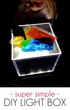 an image of a box that is filled with colored tissue paper and plastic wrappers