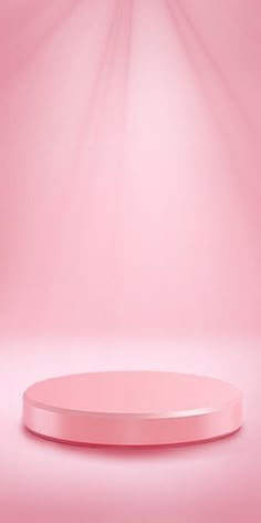 an empty pink podium with light coming from behind it on a pastel pink background