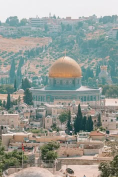 an aerial view of the dome of the rock in the middle of the old city