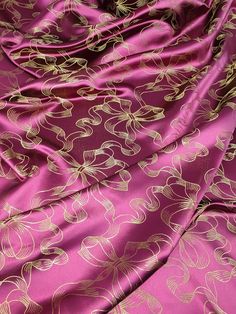 Bow brocade fabric.  Traditional brocade. Purple backrount with gold bows design.  48 inches wide. High quality brocade. We have taken great care toportray the true colours, but due to lighting and screen settings there may be a small difference in the colour. dispatched with 2nd class Royal Mail. Bows Design, Chinese Brocade, Chinese Fabric, Beaded Tulle, Tartan Dress, Check Fabric, Net Fabric, Plaid Fabric, Brocade Fabric