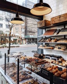 a bakery filled with lots of different types of pastries