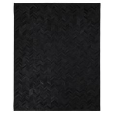 a black area rug with an abstract design