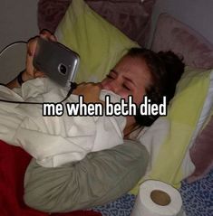 a woman laying in bed holding a cell phone to her ear with the caption me when beth died