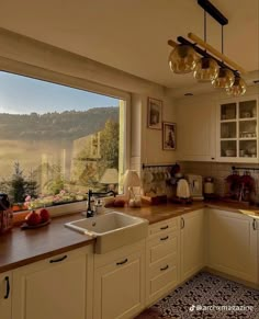 the kitchen is clean and ready for us to use in the day time, while the sun shines through the window