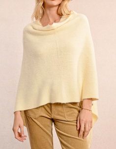 Short poncho-Soft to the touch-Round neckline-Fringes at the ends-Length from the shoulder 75 cm (for one size) Fabrics ▴ Main material: 100% acrylic Chic One Size Poncho With Batwing Sleeve, Oversized Cream Shawl Poncho, Chic One-size Poncho Shawl, Chic One-size Cape Poncho, Chic One Size Cape Poncho, One Size Cream Poncho, One Size Cream Cape For Fall, One Size Cream Fall Cape, Poncho Fashion