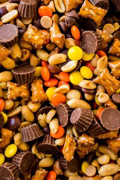 a mixture of candy, nuts and chocolate