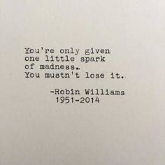 an old typewriter with the words you're only given one little spark of madness