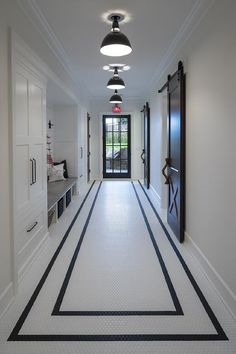 the hallway is clean and ready for us to use as an entrance way in this house