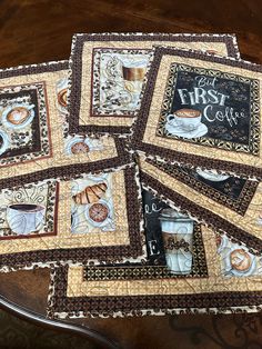 four quilted coasters with coffee images on them