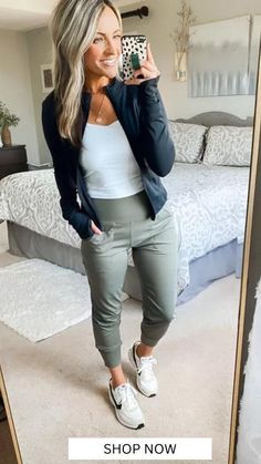 Wondering how to style joggers for a fall transition outfit? I'm styling joggers with sneakers, a workout tank top and a workout zip up jacket for a fall athleisure outfit. This would be an easy soccer mom outfit or football mom outfit. Perfect for on the go mom style this fall! Jogger pants are must for your athleisure fashion. Shop this amazo athletic outfit now. #affiliatelink Outfits With Sports Leggings, Activewear Work Outfits, Vest Athleisure Outfit, Office Scrubs Work Outfits, Sport Spectator Outfit, Professional Workout Outfit, Sage Green Joggers Outfit, Women’s Athletic Outfits 2024