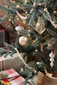 a christmas tree decorated with ornaments and lights