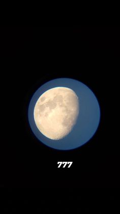 the moon seen through a telescope lens