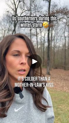 a woman with long hair standing in front of trees and text that reads, us southerners during this winter storm it's older than a mother - in law's kiss