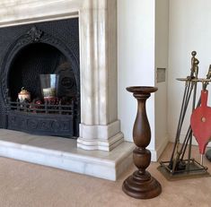 a fireplace in a living room next to a fire place