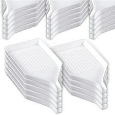 six white plastic trays stacked on top of each other