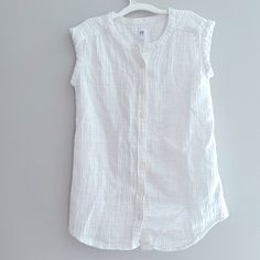 Gap Girls Size : M Supersoft Gauze-Y Texture With Double The Crinkle And Double The Fun. - Machine Wash. Cotton Color White Never Worn New Without Tags. Measurements Pit To Pit : 14” Length 24” Gap Cotton Tank Top For Summer, Sleeveless Gap Tops For Daywear, Casual Sleeveless Tops By Gap, Cute White Sleeveless Blouse, Casual Sleeveless Gap Tops, Gap Cotton Tops For Summer, White Gap Tops For Summer, Sleeveless Summer Playwear Tops, White Cotton Tank Top By Gap