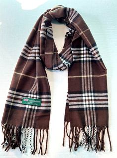 New 100% Cashmere Scarf Made in SCOTLAND Color: Refer to Picture Size: 72"L x 11"W (When opened) Length 66" inches  Fringe 3" inches on each end Total Length 72" inches  Width 12" inches  Warm, Soft and very Comfortable  Buy more save more:  **FAST Shipping** Scarf Care: HAND WASH / Reshape, Dry Flat (Hang) / Do Not Bleach This scarf would be great for anyone - men or women.  It would be a great gift for a loved one or a nice addition to your wardrobe, and make your day better!!  Just in time for the holidays!!!  These are GREAT QUALITY designer scarves. All our scarves are BRAND NEW . Each scarf provides warmth and comfort. Shipping We ship within 1 business day by USPS First Class Mail Returns All items qualify for returns within 14 days of receipt. Buyer pays return shipping. Please be Brown Winter Scarf, Brown Wool Casual Scarf, Brown Vintage Winter Scarves, Scottish Plaid Winter Scarf, Brown Handwoven Winter Scarves, Make Your Day Better, Womens Winter, Designer Scarves, Picture Size