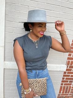 Color: Grey Style: Flattop Fedora Please see FAQ for sizing/brim details https://www.shoplivinfearless.com/pages/fedora-preview Don’t see a size you’re looking for? We take custom orders for any 3 or more fedoras. Email hello@livinfearless.com with subject ‘Custom Order’ to get started. Outfits With Fedoras For Women, How To Wear A Fedora Women, Black Fedora Hat Outfit, Fedora Hat Outfit Black Women, Fedora Hat Outfit Summer, Hat Styles For Women, Outfit With Fedora, Office Baddie, Fedora Hat Outfit