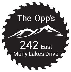 the logo for the 422 east many lakes drive, with mountains in the background