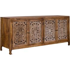 an old wooden sideboard with carvings on it