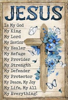 a cross with blue flowers on it and the words jesus is my god, my king