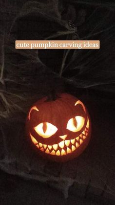 a carved pumpkin with glowing eyes on it's face and the words cute pumpkin carving ideas