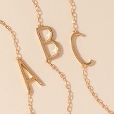 Layered looks are trending, and the luxurious Precious Elongated Initial Necklace is the perfect personal touch to your neck stack. This letter necklace is brilliantly crafted with a 14K gold-plated sterling silver chain and an elongated initial letter uniquely strung sideways. Whether you choose to wear your own initial or that of a cherished loved one, this necklace is a timeless piece that keeps your most treasured connections beautifully close to your heart. Neck Stack, Necklace B, Initial B, Jewelry Style Guide, Glam Gifts, Bar Jewelry, Disney Jewelry, Charm Rings, Charm Bangle